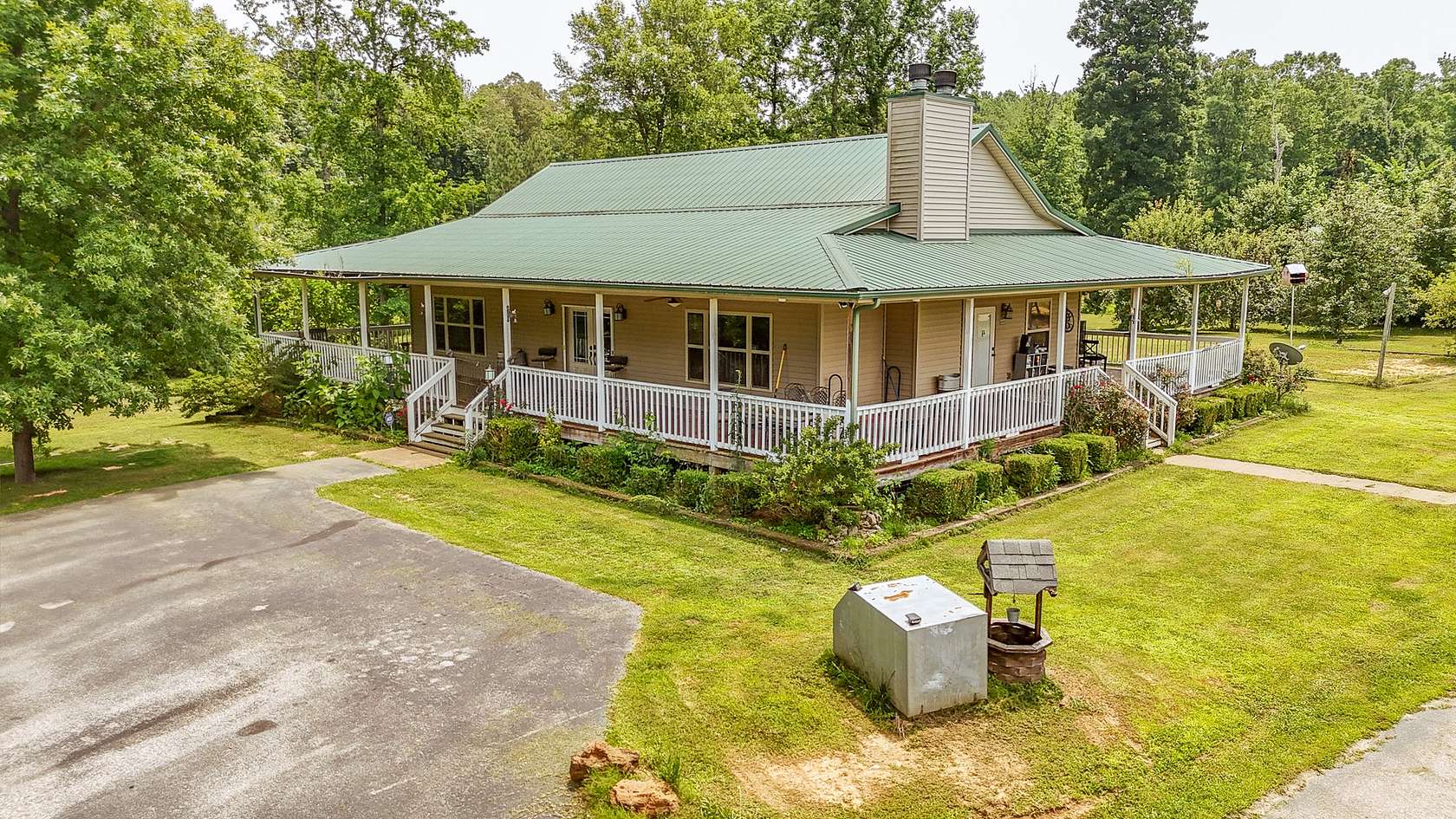 66.4 Acres of Land with Home for Sale in Hollow Rock, Tennessee