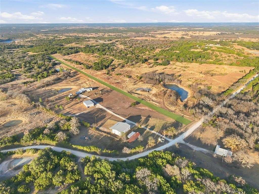 84.3 Acres of Recreational Land with Home for Sale in Bluff Dale, Texas