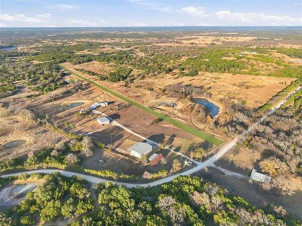 84.3 Acres of Recreational Land with Home for Sale in Bluff Dale, Texas