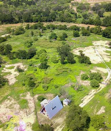 2.32 Acres of Land with Home for Sale in Mullin, Texas