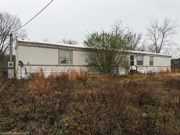 9 Acres of Residential Land with Home for Auction in Parks, Arkansas