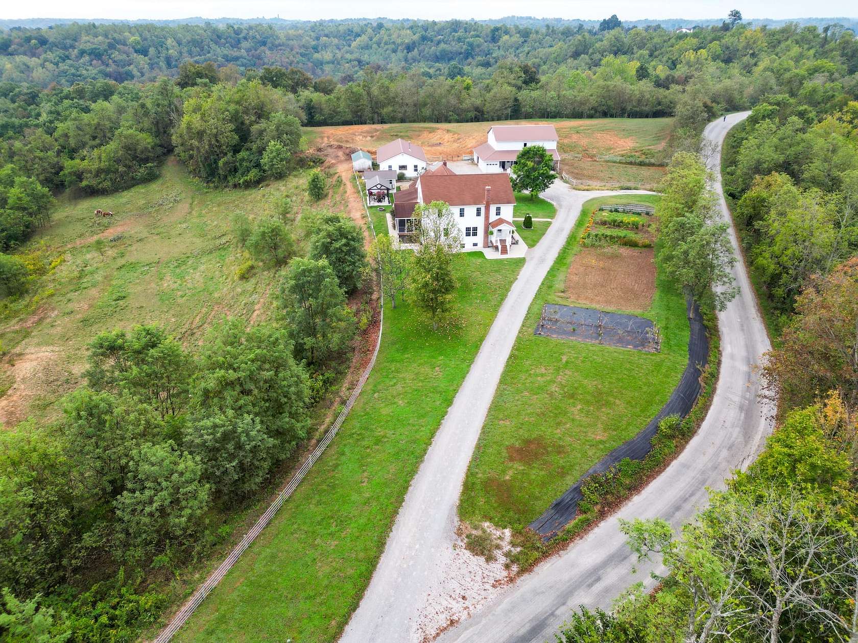 27 Acres of Land with Home for Sale in Patriot, Ohio