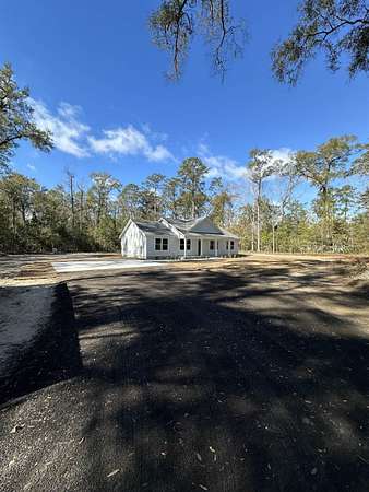 2.48 Acres of Residential Land with Home for Sale in Crawfordville, Florida