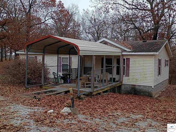 16.7 Acres of Land with Home for Sale in Warsaw, Missouri