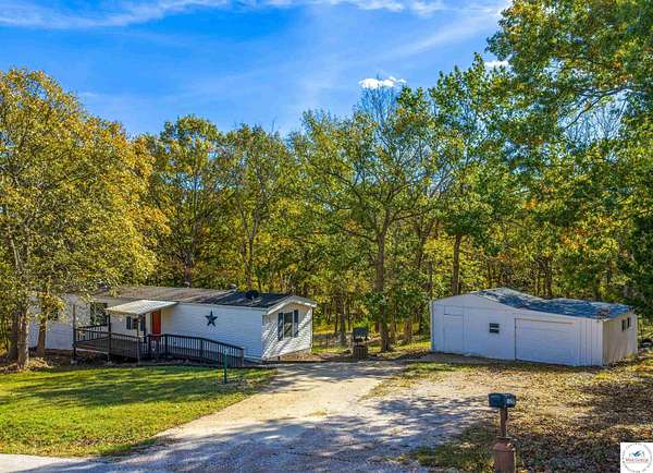 4.6 Acres of Residential Land with Home for Sale in Warsaw, Missouri