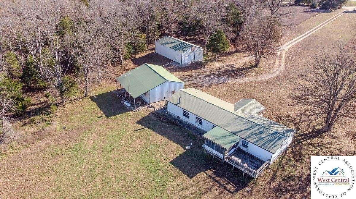 9 Acres of Residential Land with Home for Sale in Fair Play, Missouri