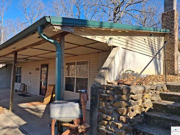 40.4 Acres of Recreational Land with Home for Sale in El Dorado Springs, Missouri