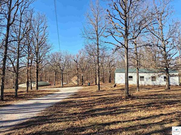 24 Acres of Recreational Land with Home for Sale in El Dorado Springs, Missouri