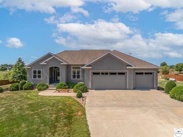 5.7 Acres of Residential Land with Home for Sale in Smithton, Missouri