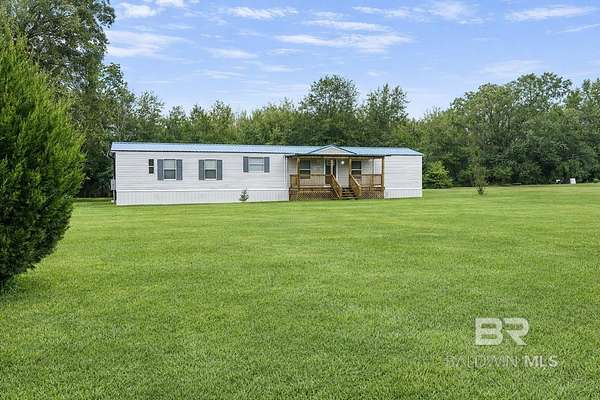 1.5 Acres of Residential Land with Home for Sale in Chunchula, Alabama