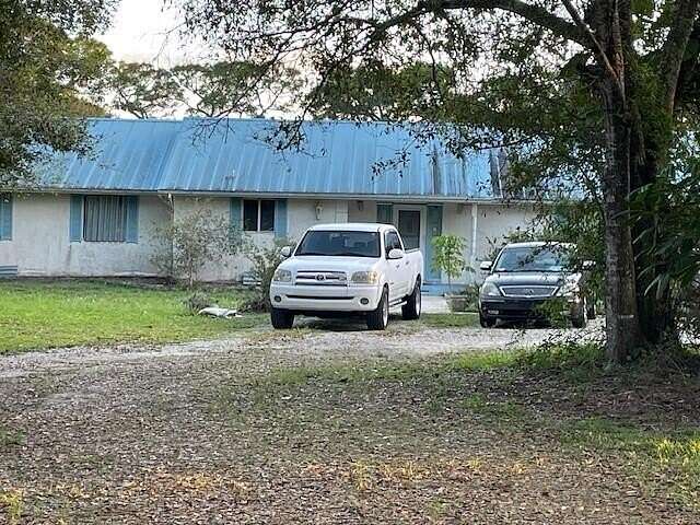 2.3 Acres of Residential Land with Home for Sale in Fort Pierce, Florida