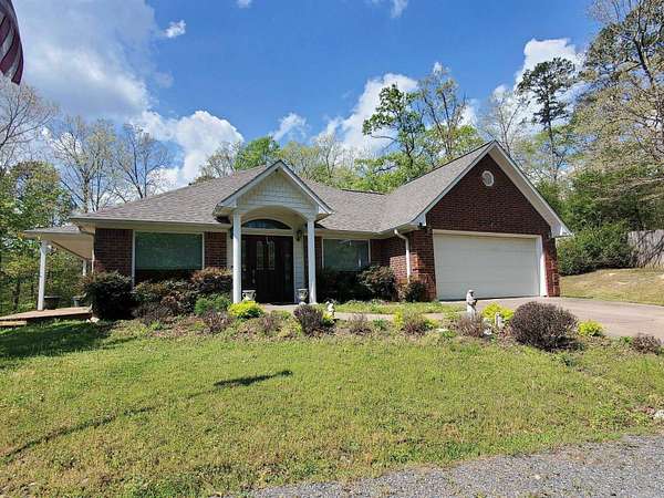 18.3 Acres of Land with Home for Sale in Mena, Arkansas