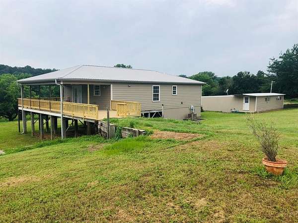 5 Acres of Residential Land with Home for Lease in Granbury, Texas