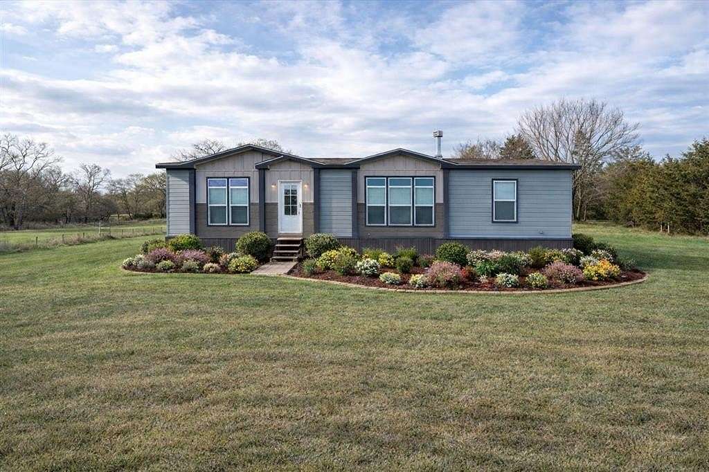 11.5 Acres of Land with Home for Sale in Sadler, Texas