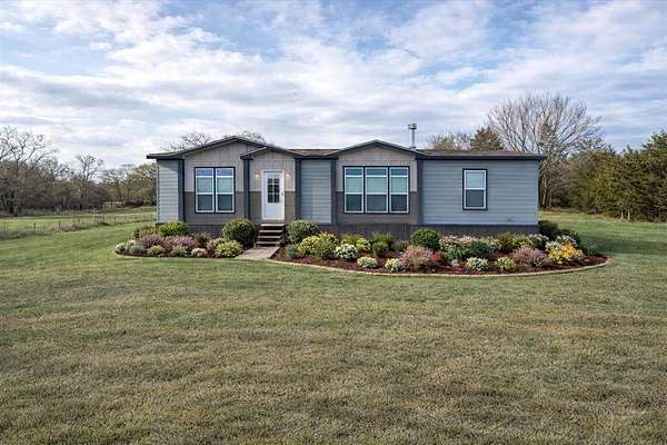 11.5 Acres of Land with Home for Sale in Sadler, Texas