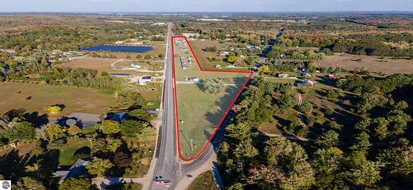 18.1 Acres of Improved Mixed-Use Land for Sale in Grawn, Michigan