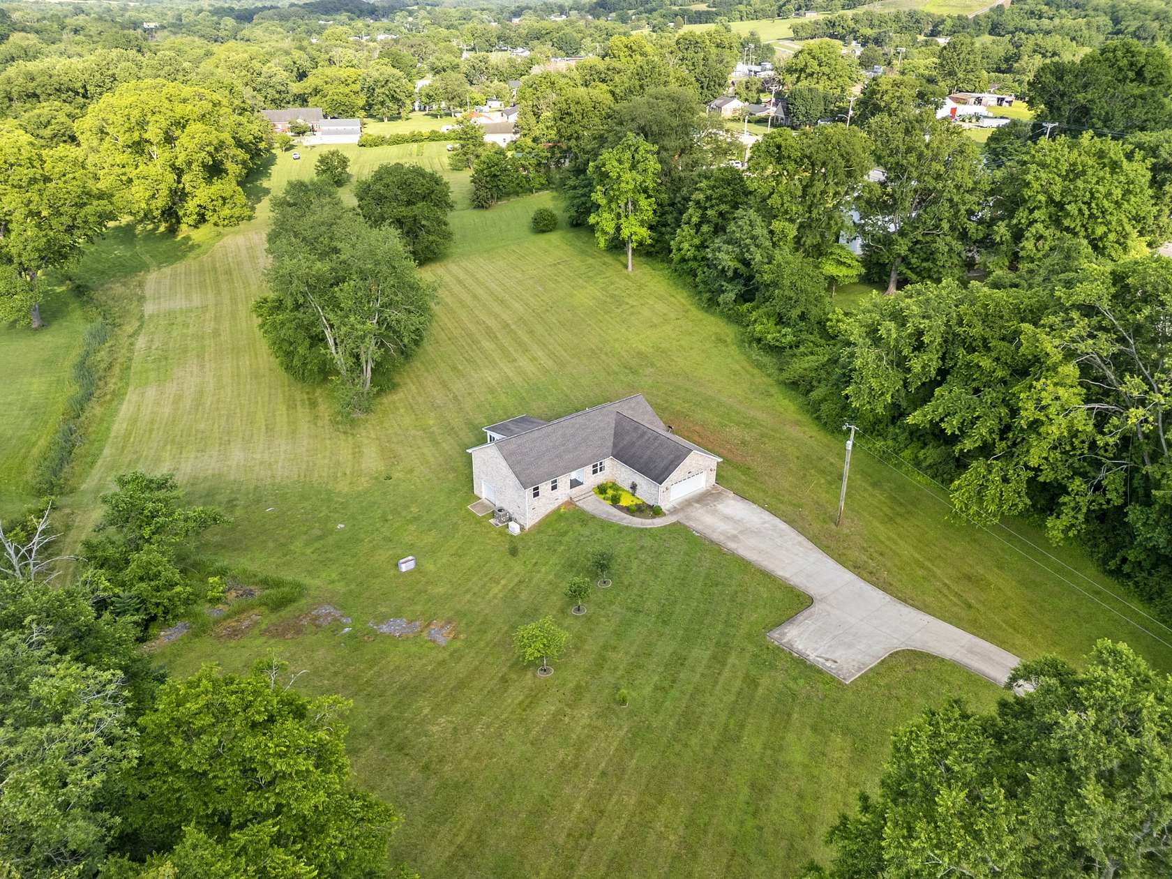 5 Acres of Residential Land with Home for Sale in Gordonsville, Tennessee