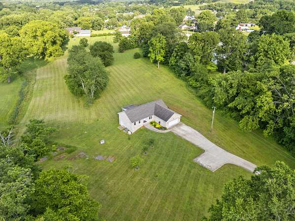 5 Acres of Residential Land with Home for Sale in Gordonsville, Tennessee