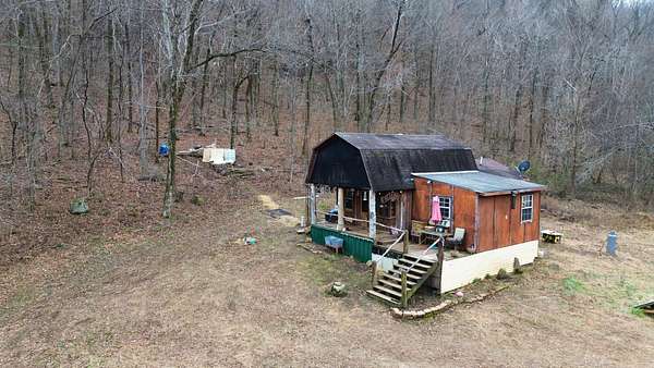 10 Acres of Residential Land with Home for Sale in Witts Springs, Arkansas