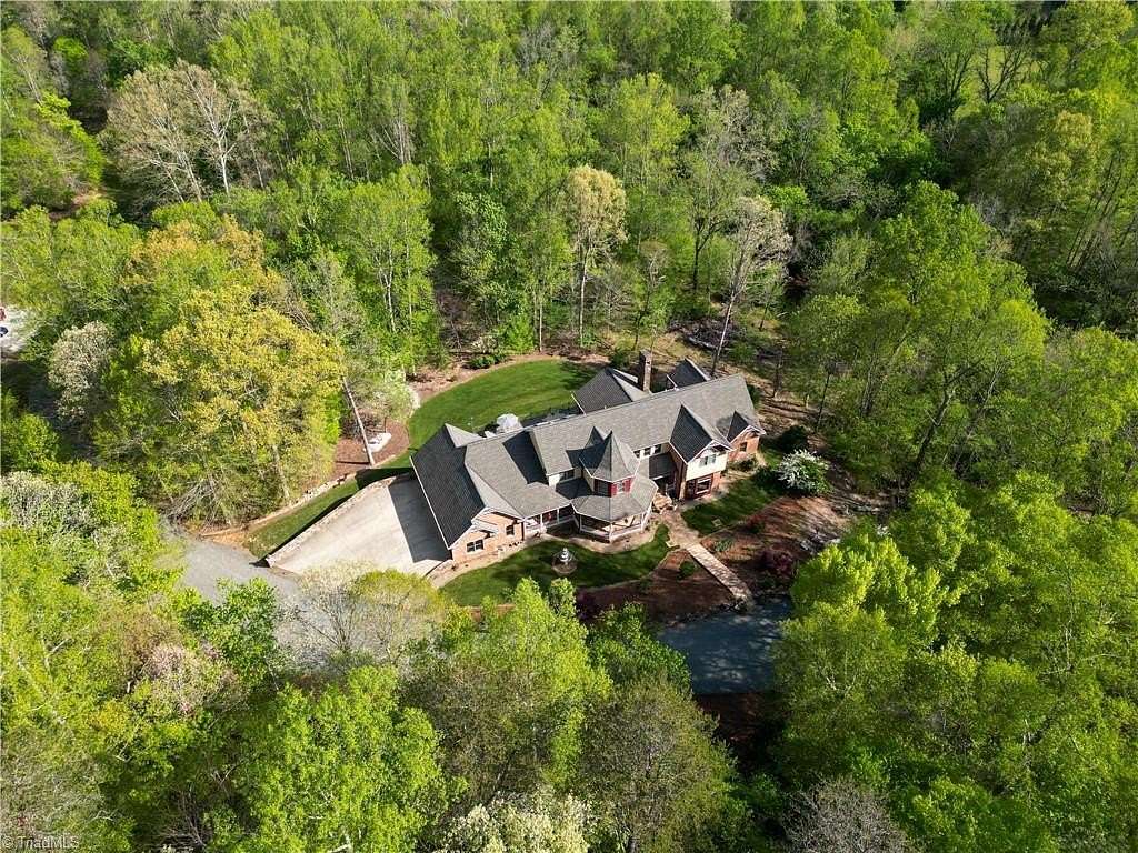 20.9 Acres of Land with Home for Sale in Tobaccoville, North Carolina