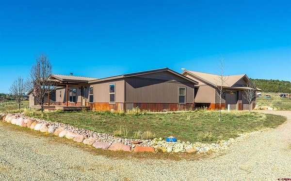 3 Acres of Residential Land with Home for Sale in Bayfield, Colorado