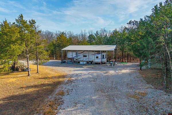 4.67 Acres of Residential Land with Home for Sale in Flippin, Arkansas