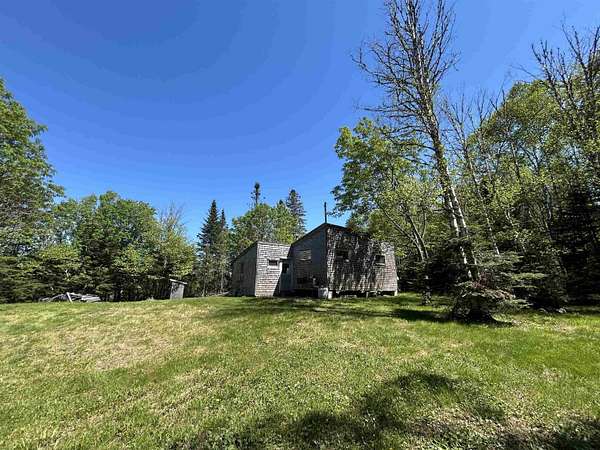 15.5 Acres of Recreational Land with Home for Sale in Stewartstown, New Hampshire