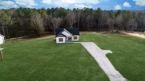 1.5 Acres of Residential Land with Home for Sale in Charlotte, Tennessee