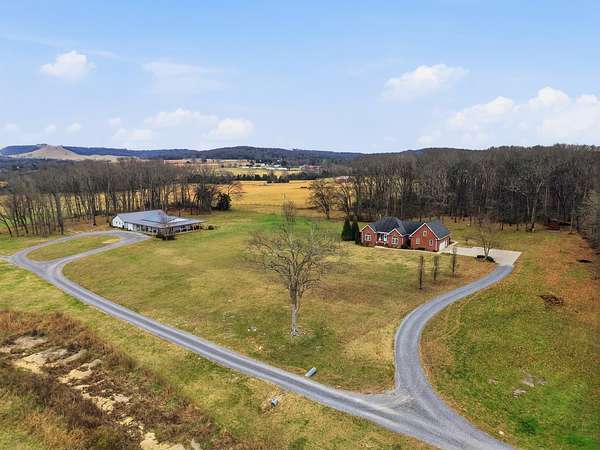 9.84 Acres of Residential Land with Home for Auction in Lebanon, Tennessee
