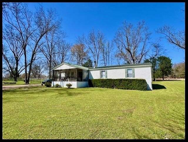 3.4 Acres of Land with Home for Sale in Crenshaw, Mississippi