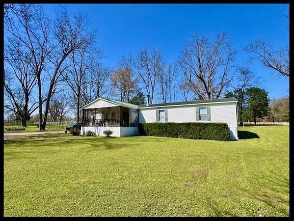 3.4 Acres of Land with Home for Sale in Crenshaw, Mississippi