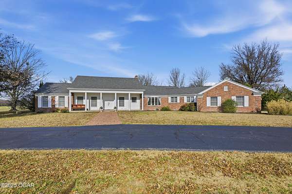 5 Acres of Residential Land with Home for Sale in Lamar, Missouri