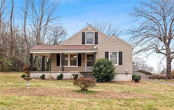 1.5 Acres of Residential Land with Home for Sale in Tobaccoville, North Carolina