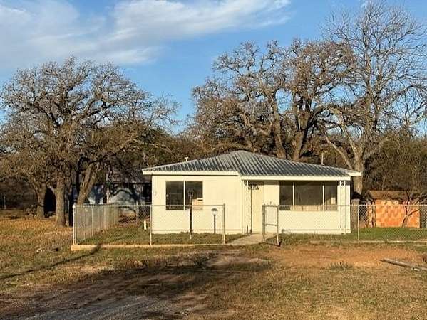 2.69 Acres of Residential Land with Home for Sale in May, Texas