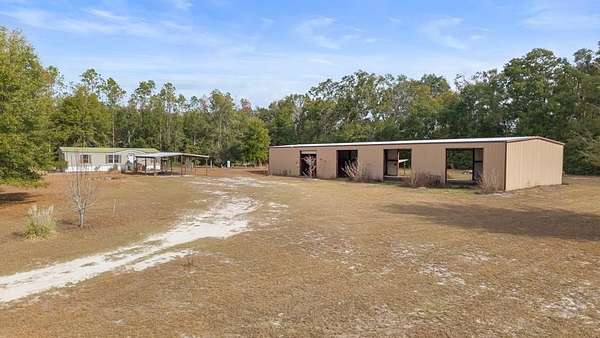 5 Acres of Residential Land with Home for Sale in O'Brien, Florida