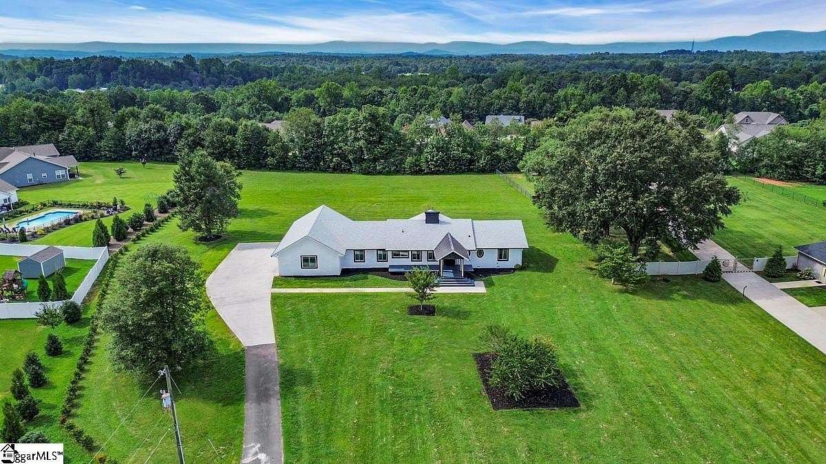 2.6 Acres of Residential Land with Home for Sale in Taylors, South Carolina