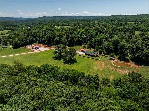 88.4 Acres of Land with Home for Sale in Prairie Grove, Arkansas