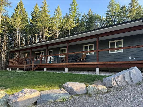 4.88 Acres of Residential Land with Home for Sale in Bigfork, Montana