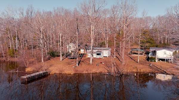 6.3 Acres of Residential Land with Home for Sale in Big Sandy, Tennessee