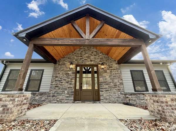 1.5 Acres of Residential Land with Home for Sale in Burnside, Kentucky