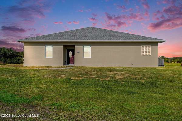 4 Acres of Residential Land with Home for Sale in Mims, Florida