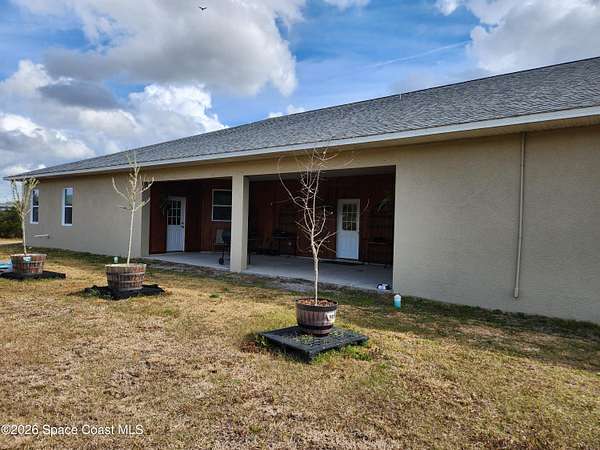 4 Acres of Residential Land with Home for Sale in Mims, Florida