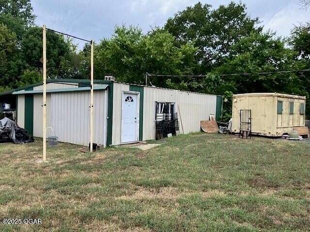 9 Acres of Land with Home for Sale in Carl Junction, Missouri