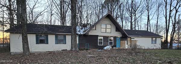 1.6 Acres of Residential Land with Home for Sale in Martin, Tennessee