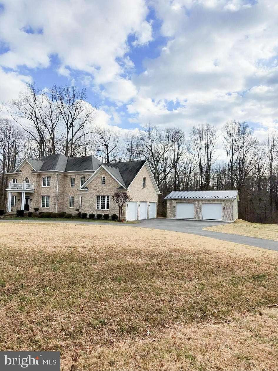2.5 Acres of Residential Land with Home for Sale in Lothian, Maryland