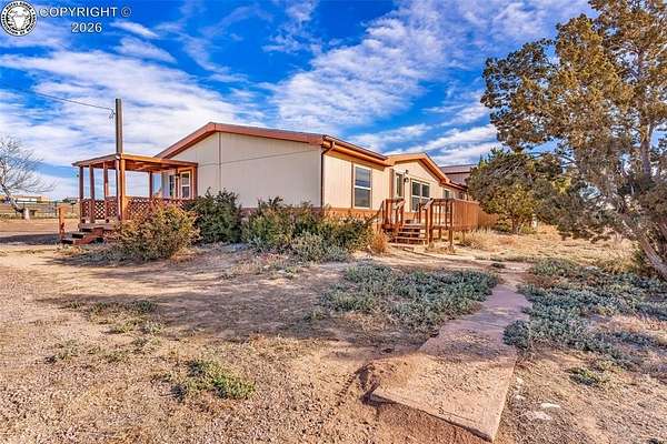 9.55 Acres of Land with Home for Sale in Penrose, Colorado