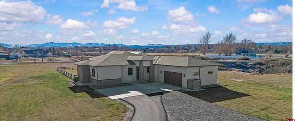 2.33 Acres of Residential Land with Home for Sale in Montrose, Colorado