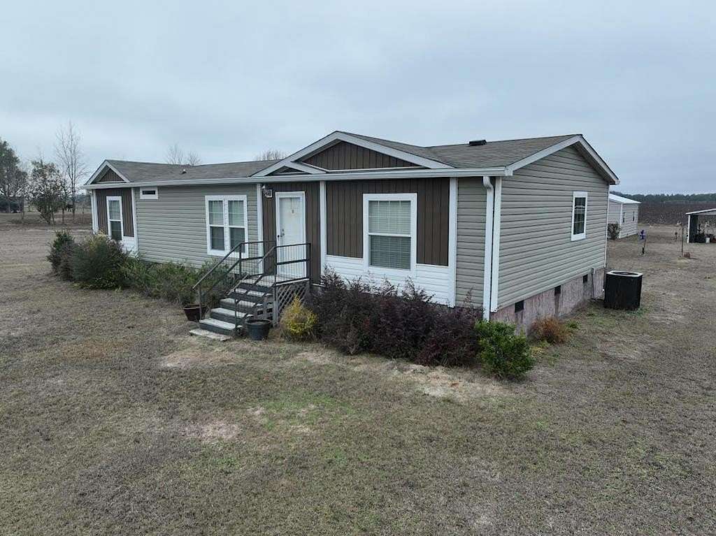 7 Acres of Residential Land with Home for Sale in Blakely, Georgia