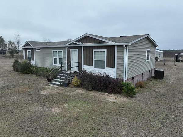 7 Acres of Residential Land with Home for Sale in Blakely, Georgia