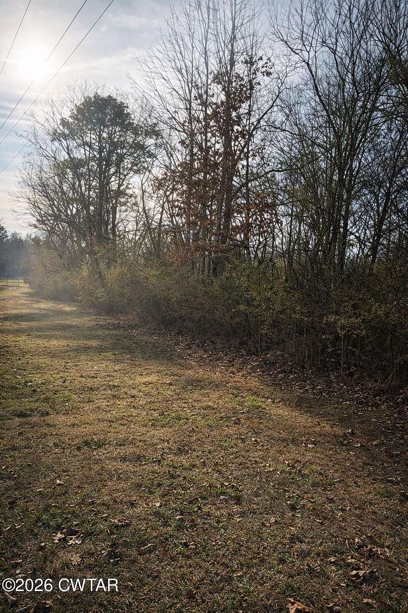 69.5 Acres of Recreational Land & Farm for Sale in Scotts Hill, Tennessee